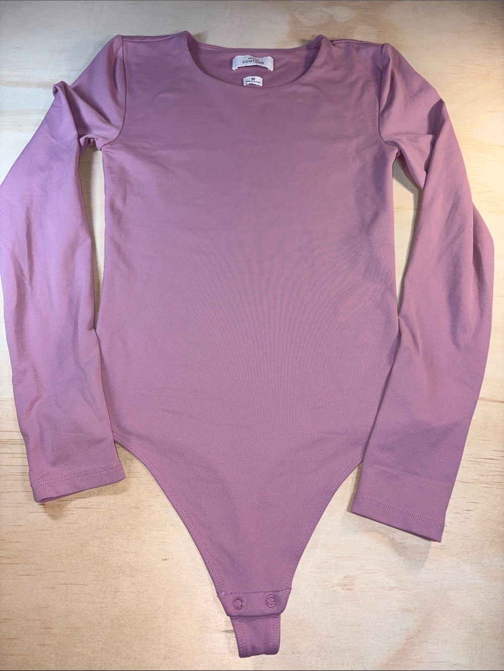 Woman’s Dusty Pink Stretch Crew Neck Body Suit Sz XS